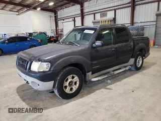 2001 Ford Explorer Sport Trac z VIN 1FMZU67E11UC81408, wystawiony jako Copart lot #64420975 z przebiegiem 185 127 mil mil oraz Szkoda całkowita • Salvage title. Historia ofert i sprzedaży dostępna na DreamBid. Obrazek 1.