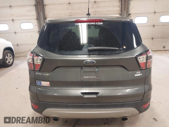 2017 Ford Escape SE with VIN 1FMCU9G90HUC96633, listed as a IAAI auction lot 42005904 with 93,139 mi miles. Bid and sale history available at carsss.com. Image 16.