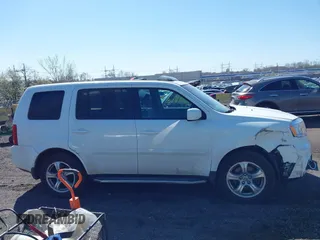 2012 Honda Pilot EX-L with VIN 5FNYF4H54CB041911, listed as a IAAI auction lot 41968540 with 124,646 mi miles and . Bid and sale history available at DreamBid. Image 13.
