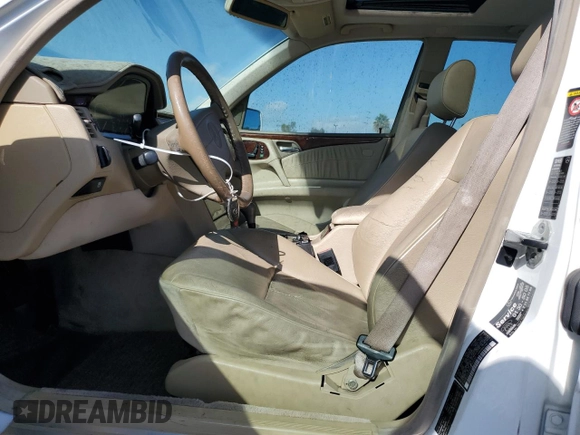 1999 Mercedes-Benz E-Class with VIN WDBJF65H6XA762532, listed as a Copart auction lot 79925364 with 196,487 mi miles and Salvage Title. Bid and sale history available at carsss.com. Image 7.