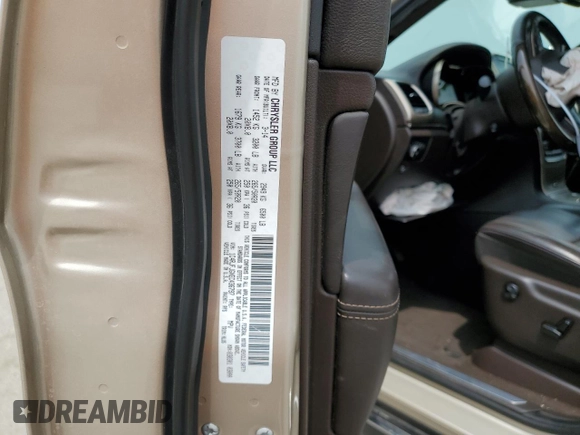 2014 Jeep Grand Cherokee Summit с VIN 1C4RJFJGXEC436797, выставлен на аукционе Copart как лот 60248595 с пробегом 156 395 миль миль и Списание • Salvage title. История ставок и продаж доступна на DreamBid. Изображение 13.