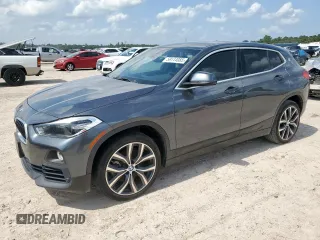 2020 BMW X2 sDrive28i with VIN WBXYH9C07L5P73232, listed as a Copart auction lot 59114085 with 108,053 mi miles and Salvage title. Bid and sale history available at DreamBid. Image 1.