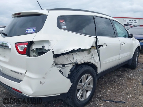2014 Chevrolet Traverse LT with VIN 1GNKRGKD6EJ273783, listed as a IAAI auction lot 42103544 with 107,179 mi miles and . Bid and sale history available at DreamBid. Image 6.
