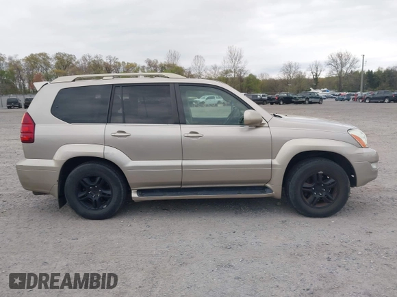 2003 Lexus GX 470 z VIN JTJBT20X230003105, wystawiony jako IAAI lot #42063855 z przebiegiem 204 004 mil mil oraz . Historia ofert i sprzedaży dostępna na DreamBid. Obrazek 13.