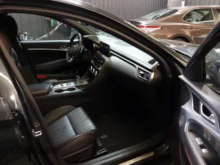 2023 Genesis G70 2.0T with VIN KMTG34TA3PU115553, listed as a IAAI auction lot 41822917 with 35,784 mi miles and . Bid and sale history available at DreamBid. Image 5.