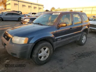 2001 Ford Escape XLS with VIN 1FMYU02141KE82552, listed as a Copart auction lot 78505184 with 223,429 mi miles and Salvage Title. Bid and sale history available at carsss.com. Image 1.