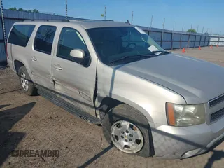 2007 Chevrolet Suburban LS with VIN 1GNFC16007J203853, listed as a IAAI auction lot 39454050 with 246,521 mi miles and . Bid and sale history available at DreamBid. Image 6.