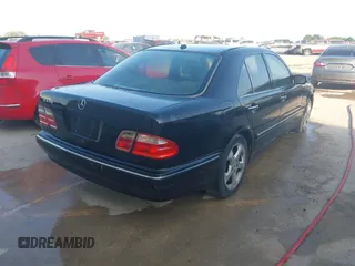 2002 Mercedes-Benz E 320 with VIN WDBJF70J02B477523, listed as a IAAI auction lot 42136739 with 251,354 mi miles and . Bid and sale history available at carsss.com. Image 4.