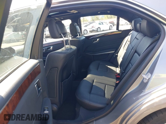 2014 Mercedes-Benz E 350 Sport with VIN WDDHF5KB4EA963178, listed as a IAAI auction lot 42021816 with 92,777 mi miles and . Bid and sale history available at DreamBid. Image 8.