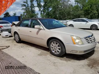 2011 Cadillac DTS Premium Collection z VIN 1G6KH5E62BU144403, wystawiony jako Copart lot #56494305 z przebiegiem 51 950 mil mil oraz Szkody całkowita. Historia ofert i sprzedaży dostępna na DreamBid. Obrazek 4.