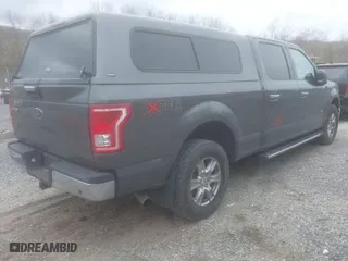 2015 Ford F-150 XLT w/HD Payload Pkg with VIN 1FTFW1EG6FFA46006, listed as a IAAI auction lot 41942359 with 144,221 mi miles. Bid and sale history available at carsss.com. Image 4.