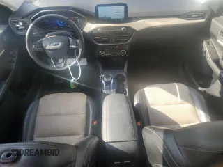 2021 Ford Escape Titanium Hybrid z VIN 1FMCU9DZ9MUA18764, wystawiony jako Copart lot #78848764 z przebiegiem 89 499 mil mil oraz Nie do naprawy • Non repairable. Historia ofert i sprzedaży dostępna na DreamBid. Obrazek 8.