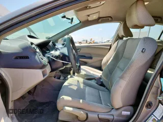 2010 Honda Insight LX with VIN JHMZE2H52AS043392, listed as a Copart auction lot 61347625 with 194,248 mi miles and Salvage title. Bid and sale history available at DreamBid. Image 7.
