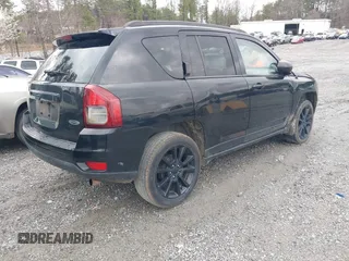 2014 Jeep Compass Sport with VIN 1C4NJCBA9ED823228, listed as a IAAI auction lot 41714992 with 168,996 mi miles. Bid and sale history available at carsss.com. Image 4.