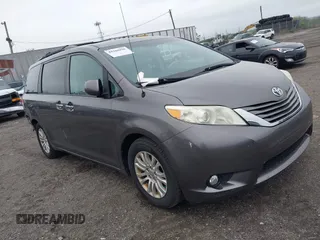 2014 Toyota Sienna XLE with VIN 5TDYK3DC0ES436502, listed as a IAAI auction lot 42180990 with 154,839 mi miles and . Bid and sale history available at DreamBid. Image 1.