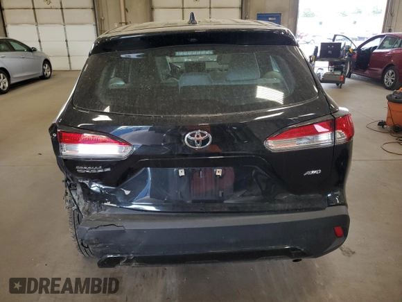 2023 Toyota Corolla Cross L with VIN 7MUAAABG8PV049431, listed as a Copart auction lot 56982055 with 20,275 mi miles and Salvage title. Bid and sale history available at DreamBid. Image 6.