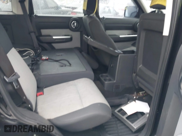 2009 Dodge Nitro SLT with VIN 1D8GU58K19W525618, listed as a IAAI auction lot 41726192 with 999,999 mi miles. Bid and sale history available at carsss.com. Image 8.