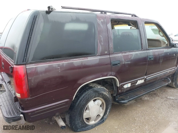 1997 Chevrolet Tahoe with VIN 1GNEK13R8VJ329165, listed as a IAAI auction lot 41631672 with 166,976 mi miles. Bid and sale history available at carsss.com. Image 6.