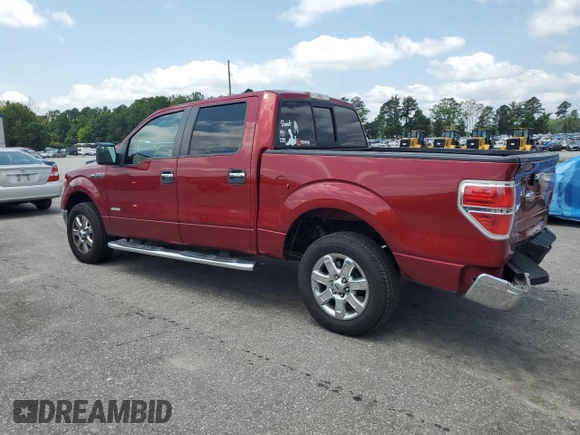 2014 Ford F-150 XL with VIN 1FTFW1CT7EKG41338, listed as a Copart auction lot 60037405 with 128,130 mi miles and Salvage title. Bid and sale history available at DreamBid. Image 2.