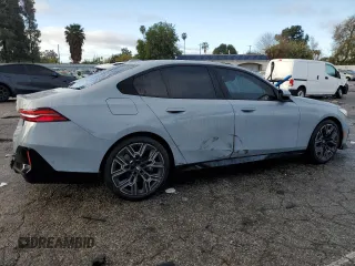 2024 BMW 5 Series 530i with VIN WBA43FJ03RCS86607, listed as a Copart auction lot 45236395 with 2,162 mi miles and Salvage Title. Bid and sale history available at carsss.com. Image 3.