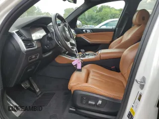 2019 BMW X5 xDrive40i z VIN 5UXCR6C53KLL14870, wystawiony jako Copart lot #57847245 z przebiegiem 97 201 mil mil oraz Szkoda całkowita • Salvage title. Historia ofert i sprzedaży dostępna na DreamBid. Obrazek 7.