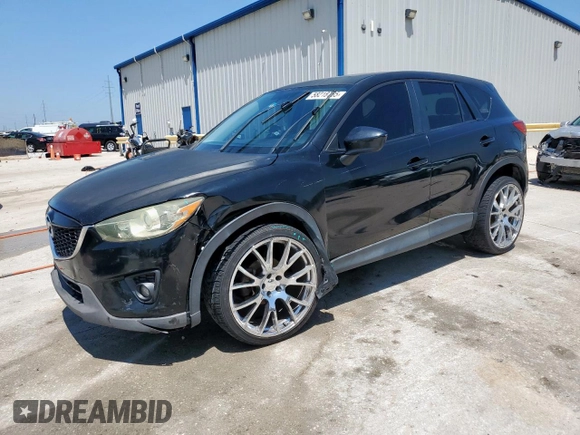 2014 Mazda CX-5 Touring with VIN JM3KE2CY5E0316077, listed as a Copart auction lot 58218735 with 190,789 mi miles and Salvage title. Bid and sale history available at DreamBid. Image 1.