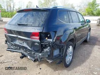 2019 Volkswagen Atlas SE with VIN 1V2UR2CA3KC613611, listed as a IAAI auction lot 42135382 with 62,514 mi miles and . Bid and sale history available at DreamBid. Image 4.