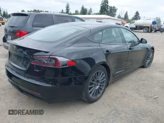2021 Tesla Model S Plaid with VIN 5YJSA1E62MF447509, listed as a IAAI auction lot 42509281 with 32,372 mi miles and . Bid and sale history available at DreamBid. Image 4.