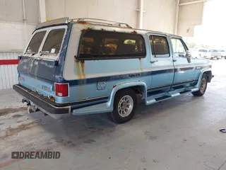 1989 GMC Suburban with VIN 1GKER16K7KF509078, listed as a IAAI auction lot 42593032 with 86,175 mi miles and . Bid and sale history available at DreamBid. Image 4.