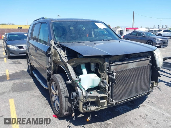2013 Honda Pilot Touring with VIN 5FNYF3H94DB024069, listed as a IAAI auction lot 42638568 with 190,326 mi miles and . Bid and sale history available at DreamBid. Image 1.