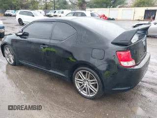 2013 Scion tC with VIN JTKJF5C79D3051664, listed as a IAAI auction lot 42027579 with 211,322 mi miles. Bid and sale history available at carsss.com. Image 3.
