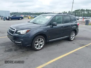 2018 Subaru Forester Touring with VIN JF2SJAWC2JH492788, listed as a IAAI auction lot 42358591 with 83,354 mi miles and . Bid and sale history available at DreamBid. Image 2.