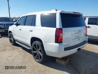 2015 Chevrolet Tahoe LS with VIN 1GNSCAKCXFR748554, listed as a IAAI auction lot 41765865 with 160,282 mi miles and . Bid and sale history available at DreamBid. Image 3.