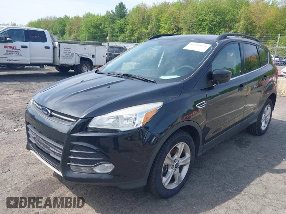 2014 Ford Escape SE with VIN 1FMCU9GXXEUD40924, listed as a IAAI auction lot 42230156 with 190,238 mi miles and . Bid and sale history available at DreamBid. Image 17.