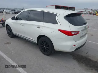 2013 Infiniti JX35 with VIN 5N1AL0MM5DC325574, listed as a IAAI auction lot 42011771 with 173,656 mi miles and . Bid and sale history available at DreamBid. Image 3.