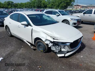 2021 Mazda 3 S with VIN JM1BPAAL6M1331801, listed as a IAAI auction lot 42553233 with 107,058 mi miles and . Bid and sale history available at DreamBid. Image 1.