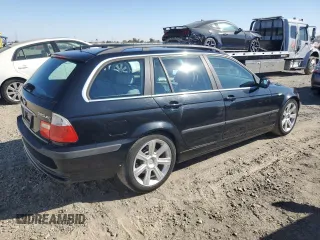 2002 BMW 3 Series 325xi with VIN WBAEP33492PF00590, listed as a Copart auction lot 78005834 with 146,279 mi miles and Clean Title. Bid and sale history available at carsss.com. Image 3.