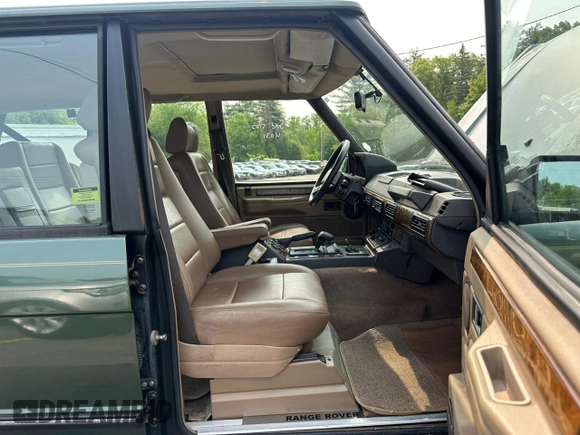 1990 Land Rover Range Rover z VIN SALHV1249LA408661, wystawiony jako Copart lot #59861925 z przebiegiem 129 140 mil mil oraz Czysty tytuł • Clean title. Historia ofert i sprzedaży dostępna na DreamBid. Obrazek 6.