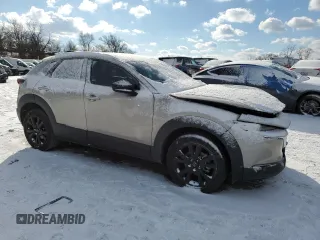 2024 Mazda CX-30 2.5 S Select Sport with VIN 3MVDMBBM9RM627970, listed as a Copart auction lot 87513045 with 8,716 mi miles and Salvage Title. Bid and sale history available at carsss.com. Image 4.