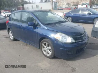 2012 Nissan Versa S with VIN 3N1BC1CPXCK250182, listed as a IAAI auction lot 41697818 with 122,450 mi miles. Bid and sale history available at carsss.com. Image 1.
