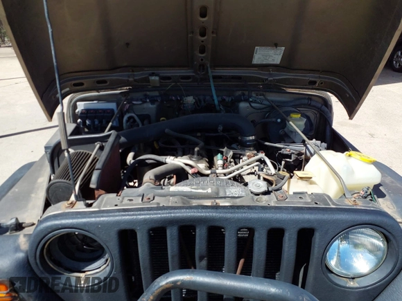 2005 Jeep Wrangler Sport with VIN 1J4FA49S45P345673, listed as a IAAI auction lot 41830128 with 139,432 mi miles. Bid and sale history available at carsss.com. Image 10.