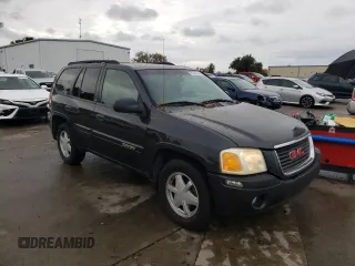 2003 GMC Envoy SLE with VIN 1GKDS13S632226264, listed as a Copart auction lot 82461694 with Not Provided miles and Clean Title. Bid and sale history available at carsss.com. Image 4.