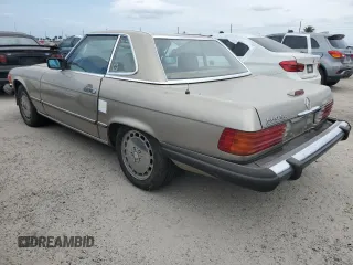 1988 Mercedes-Benz 560 560SL with VIN WDBBA48D2JA082358, listed as a Copart auction lot 76776024 with 105,148 mi miles and Salvage Title. Bid and sale history available at carsss.com. Image 2.