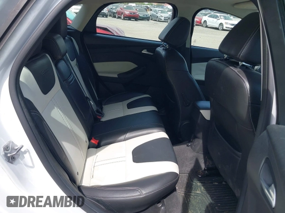 2014 Ford Focus SE with VIN 1FADP3K25EL251024, listed as a IAAI auction lot 42123157 with 74,311 mi miles and . Bid and sale history available at carsss.com. Image 8.