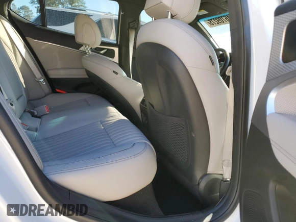 2022 Genesis G70 3.3T with VIN KMTG54TE3NU084590, listed as a Copart auction lot 46709275 with 21,664 mi miles and Salvage title. Bid and sale history available at DreamBid. Image 10.