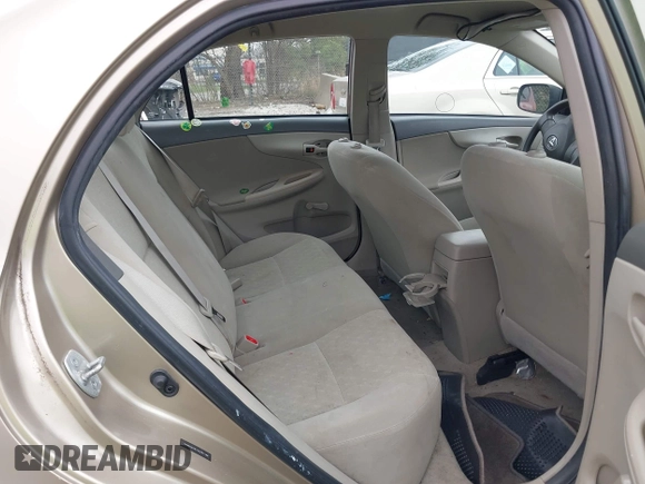 2010 Toyota Corolla with VIN 1NXBU4EE7AZ297198, listed as a IAAI auction lot 42080980 with 142,176 mi miles. Bid and sale history available at carsss.com. Image 8.
