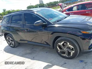 2022 Hyundai Tucson SEL with VIN 5NMJC3AE2NH019454, listed as a IAAI auction lot 42318154 with 43,839 mi miles and . Bid and sale history available at DreamBid. Image 14.