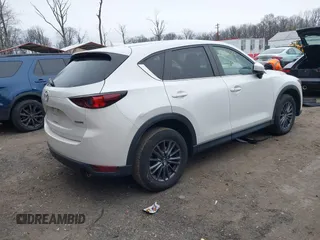 2020 Mazda CX-5 Touring with VIN JM3KFBCM5L1737640, listed as a IAAI auction lot 41613576 with 1 mi miles. Bid and sale history available at carsss.com. Image 4.