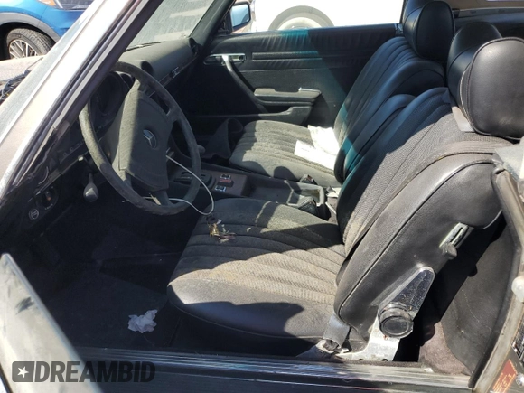 1979 Mercedes-Benz SL with VIN 10704412056845, listed as a Copart auction lot 74874294 with 148,200 mi miles and Salvage title. Bid and sale history available at DreamBid. Image 7.