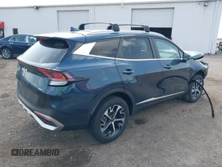 2023 Kia Sportage EX with VIN KNDPVCAGXP7104090, listed as a IAAI auction lot 42144158 with 26,983 mi miles and . Bid and sale history available at DreamBid. Image 4.